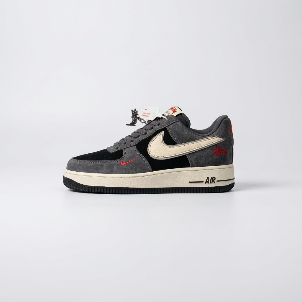 Air Force 1 x Stüssy Grey Black sneaker on a light studio background